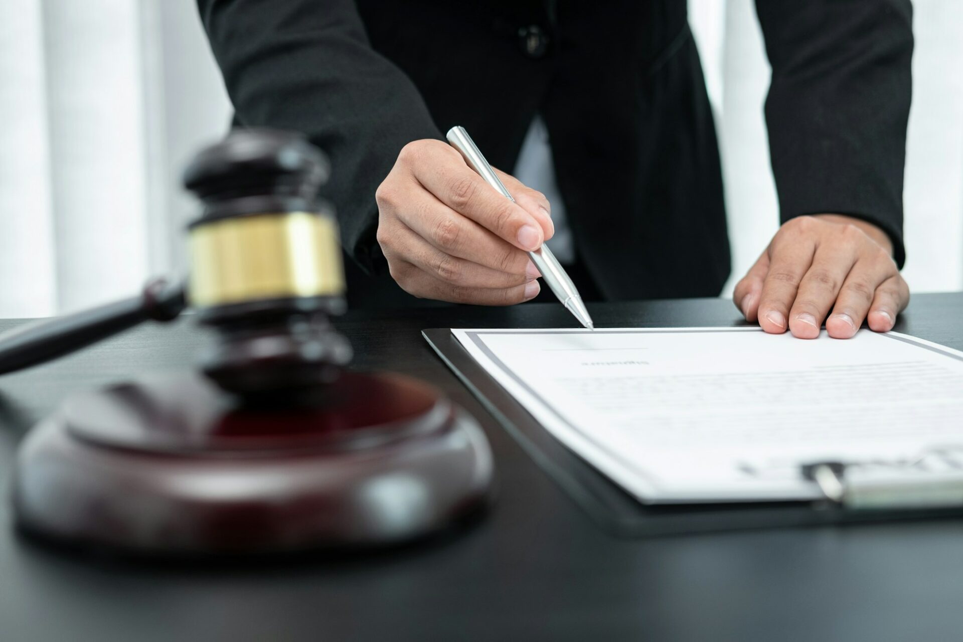 Female lawyer working with legal case document contract