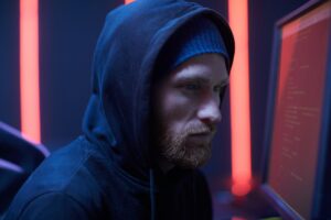 Computer programmer busy with his work