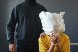 Criminal man kidnapping little boy