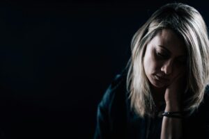 Depression - Dark Portrait of a Depressed Woman