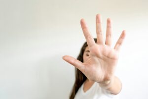 Female raised a hand for self-defense, fight against the violence against women