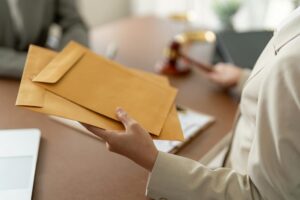 Legal Advisor Delivering Documents to Client. Confidential Legal Exchange