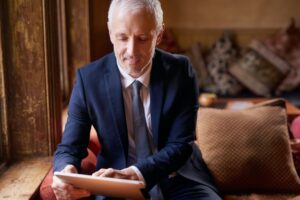 He never goes anywhere without his tablet