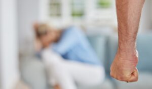 domestic violence in home, angry man fist threaten fear in scared woman and awareness of abuse pain