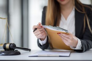 female intelligent law attorney lawyers working at the law firms. Judge gavel with scales of justice