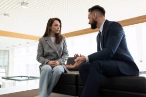 a lawyer communicates with his client before starting a court case