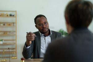 african american attorney, lawyers discussing contract or business agreement at law firm office, Bus