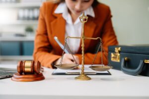 justice and law concept. Male judge in a courtroom the gavel, working