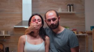 Scared victim of domestic violence