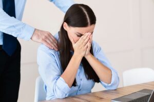 Unrecognizable Boss Sexually Harassing Employee Lady At Workplace, Cropped