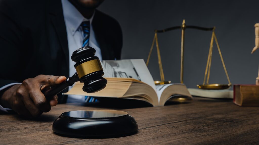 Lawyer showing judge gavel . Business Man hold judge gavel