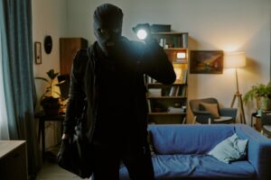 Unrecognizable Man in Balaclava Looking at Camera