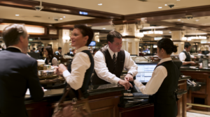 Casino employees processing financial transactions that may become part of the paper trail in a Nevada money laundering investigation.