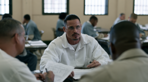 Person in a Nevada correctional setting reviewing documents related to a criminal case before sentencing.