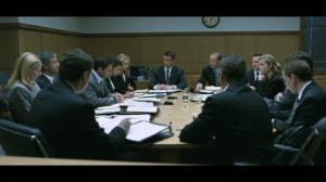 Jurors reviewing documents together during deliberations after hearing evidence in a Nevada criminal trial.